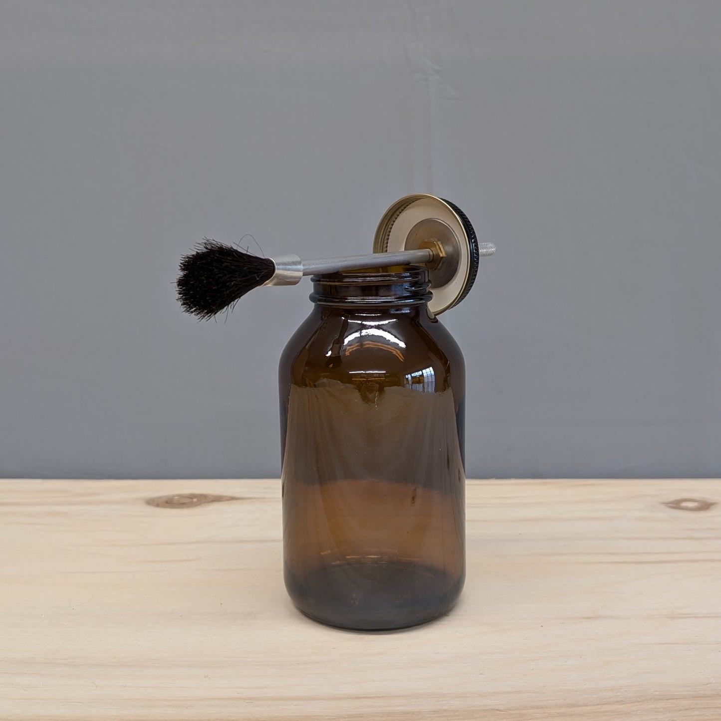 Amber Glass Cement Dispenser